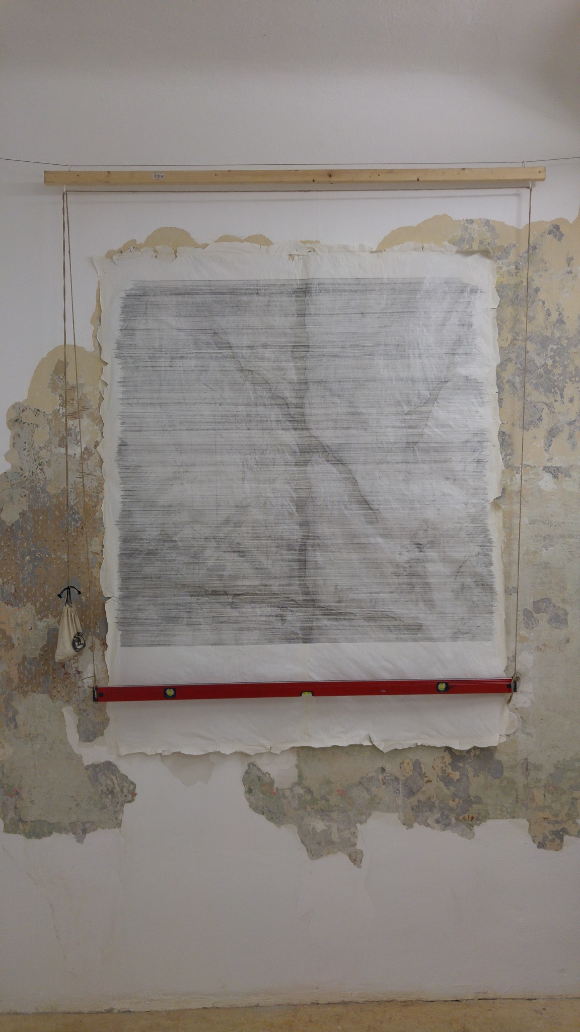 Literary Frottage in progress with a spirit level