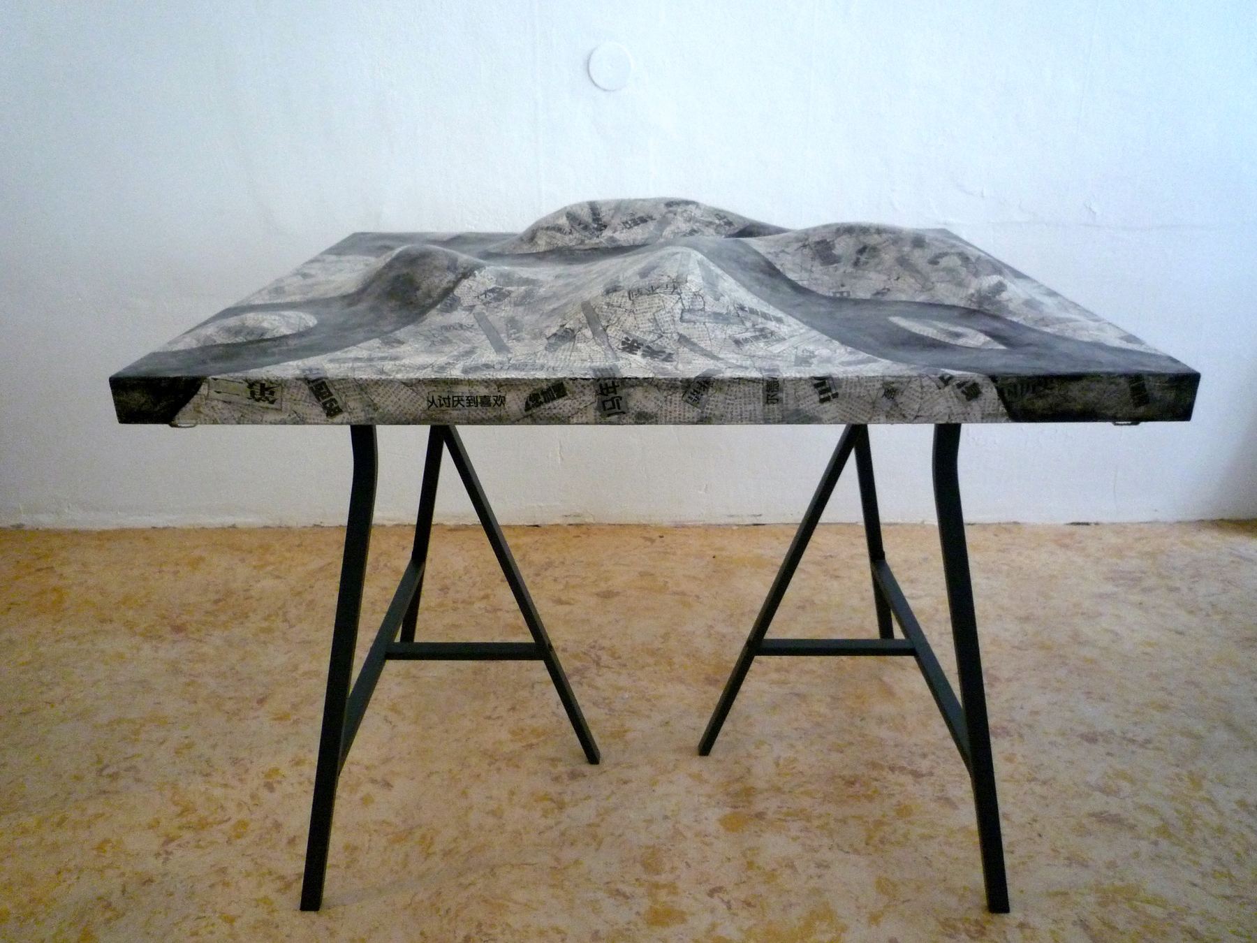 Chinese Financial Times Weekend transformed into a sculptural newspaper landscape