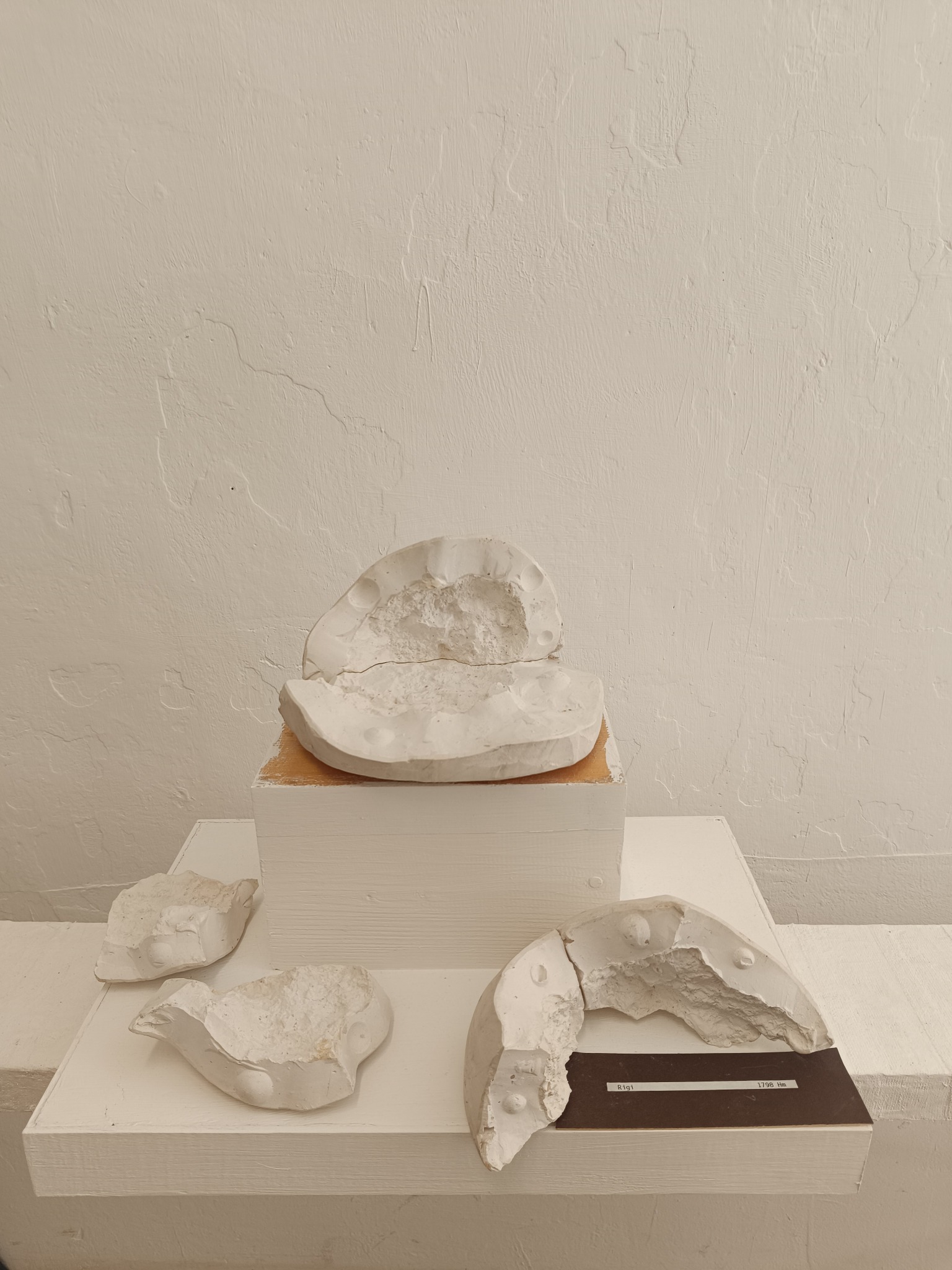 Group of original plaster summit-stone moulds from Demontage